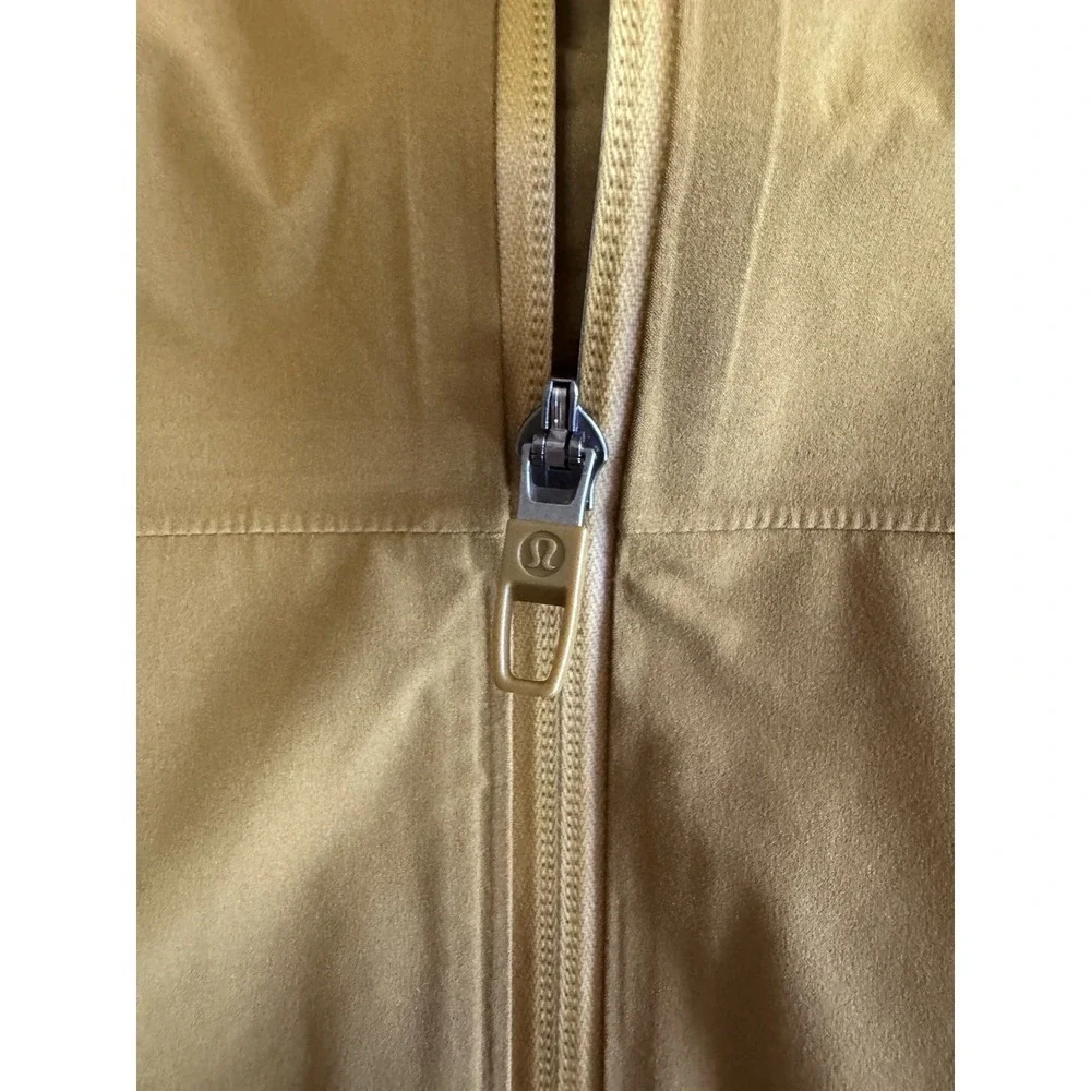 NEW Lululemon Stretch Glyde Waterproof Jacket Size Small Melt Yellow Cinchable - Picture 10 of 16